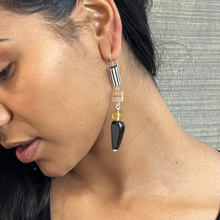 Ena wears Nanshe Designer Earrings made from limited edition materials, natural gems and recycled sterling silver