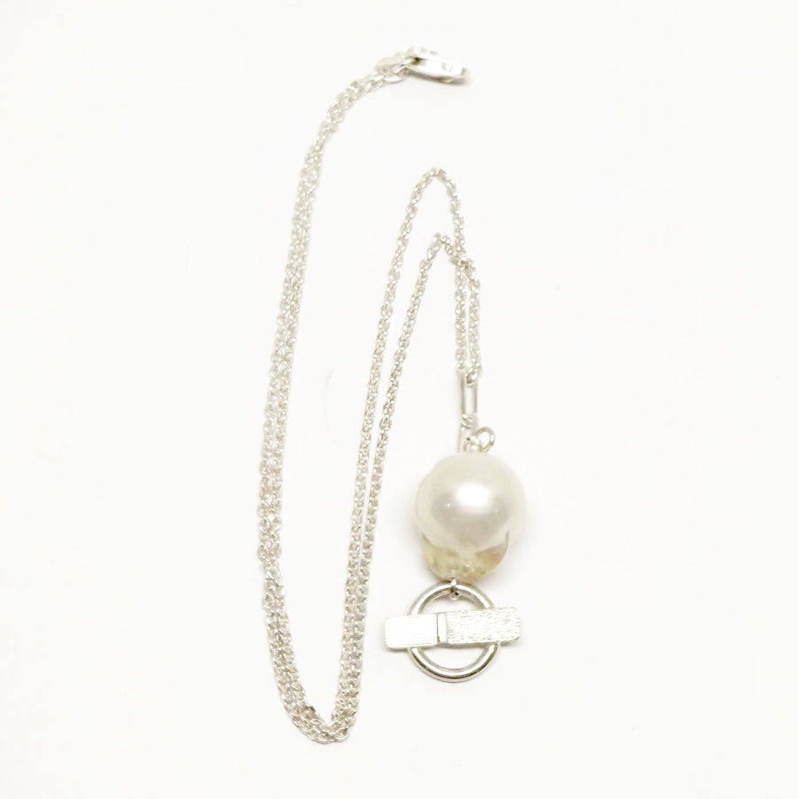 Small Baroque pearl and sterling silver pendant