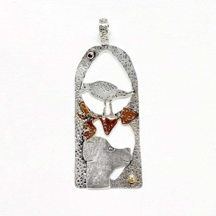 Pendant of sterling silver and copper, ruby and orange sapphire