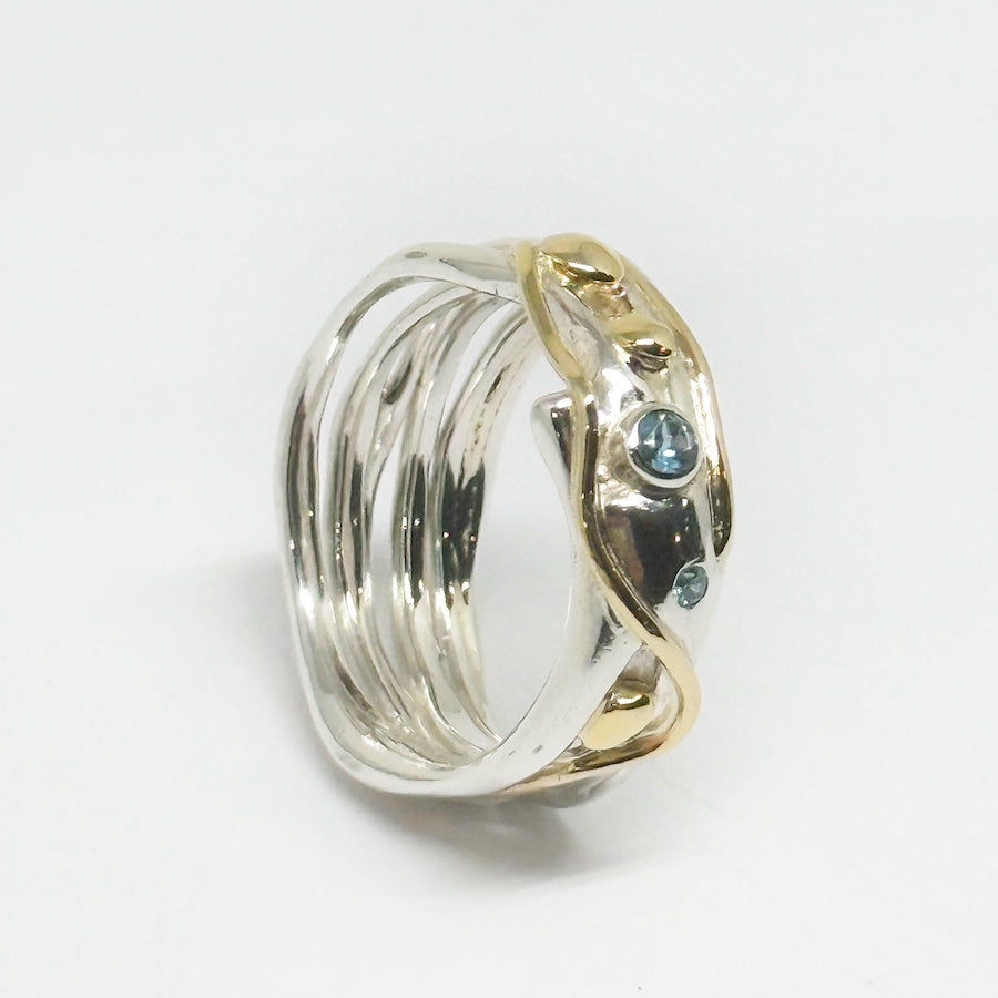 Ring insterling silver &  9ct Yellow gold with 2 Blue Zircons