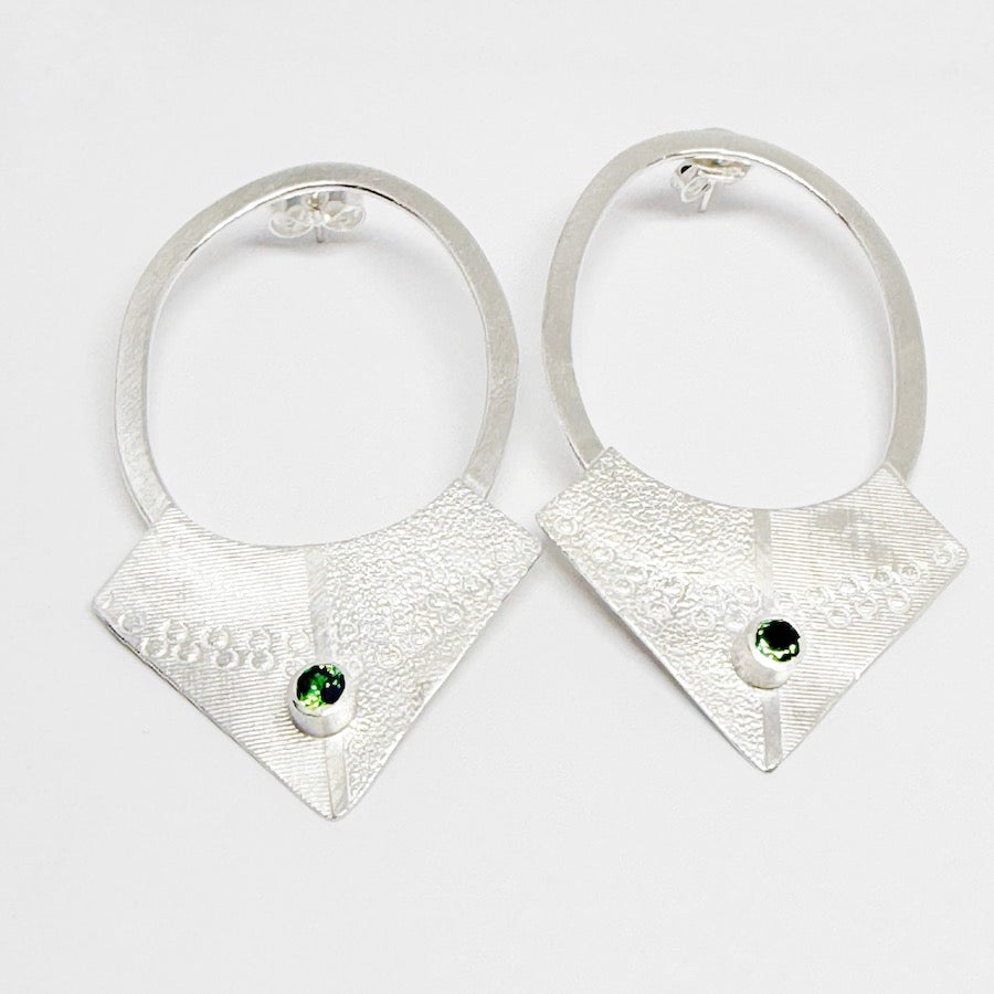 Earring studs made in recycled sterling silver with natural peridots