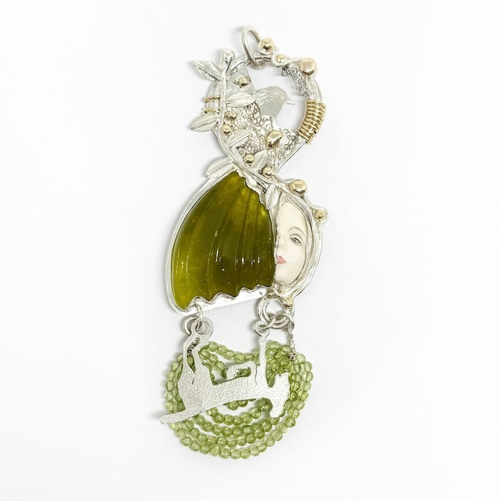 Pendant in sterling silver, 9ct gold, vesuvianite, salvaged ceramic face, 14kt gold filled wire