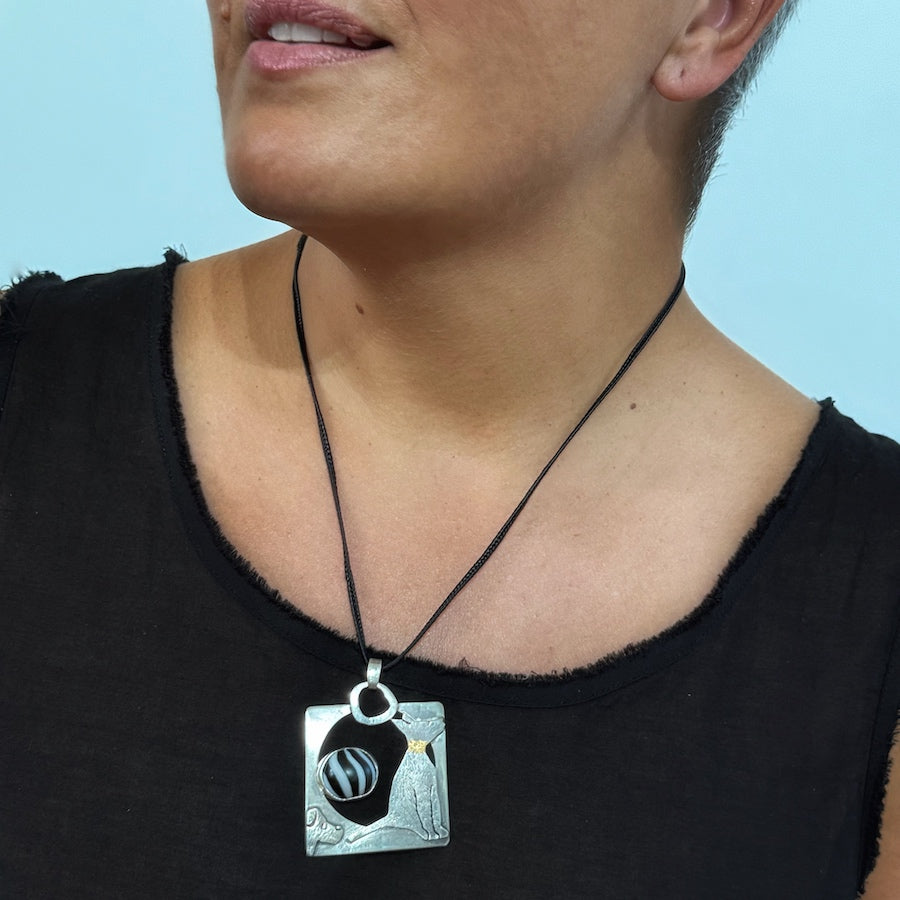 Pendant of sterling silver with vintage hand made glass, 9ct gold leaf