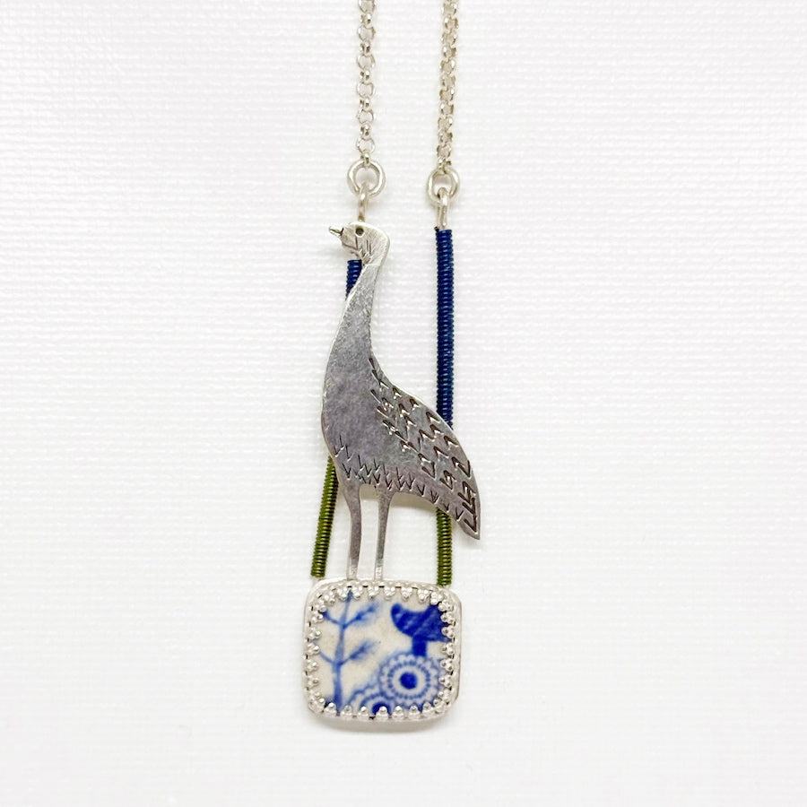 Pendant in Sterling Silver with antique pottery with dk blue enamel coated wire